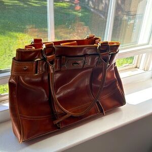 Brown leather bag gently used